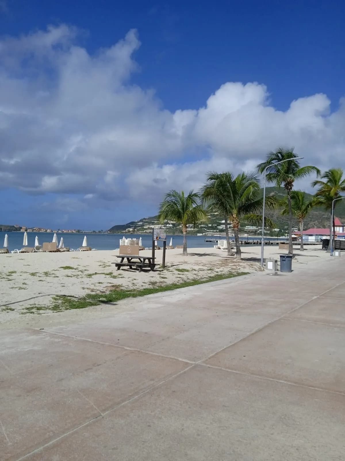 Great Bay Beach and Philipsburg boardwalk with turquoise water, St. Maarten