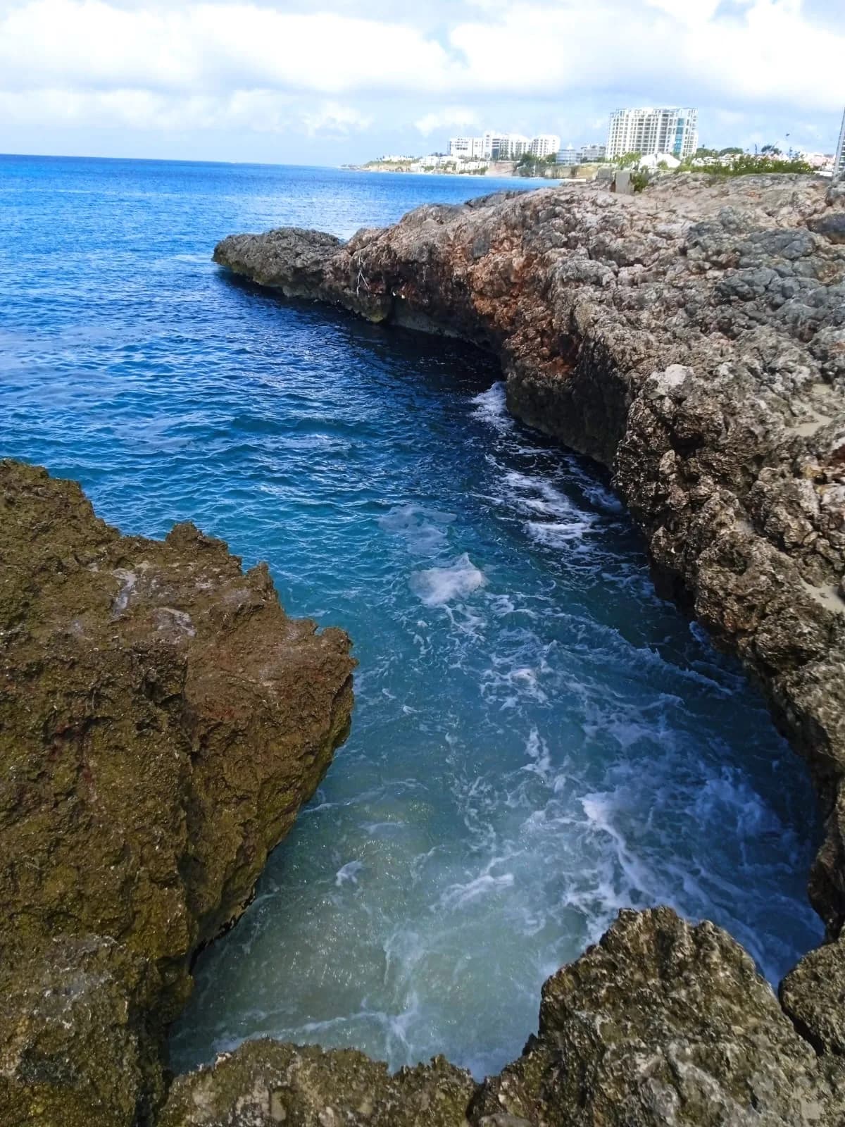 Rocky coastline and turquoise waters near Cupecoy Beach, St. Maarten